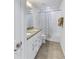 Clean bathroom with double vanity and bathtub at 6216 Kevesta Ave, Palmetto, FL 34221