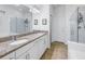 Bathroom with granite countertop double sinks at 6216 Kevesta Ave, Palmetto, FL 34221