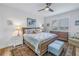 Bright bedroom with wood furniture and water view at 6216 Kevesta Ave, Palmetto, FL 34221