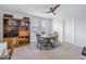 Charming dining area with a wooden table and built-in shelving at 6216 Kevesta Ave, Palmetto, FL 34221