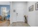 Bright and airy entryway with tile flooring and access to other rooms at 6216 Kevesta Ave, Palmetto, FL 34221