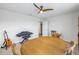 Game room with a table, chairs, and musical instruments at 6216 Kevesta Ave, Palmetto, FL 34221