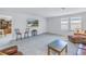 Bright Gathering room featuring a large TV and comfortable seating at 6216 Kevesta Ave, Palmetto, FL 34221