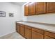 Bright laundry room with ample cabinetry and countertop space at 6216 Kevesta Ave, Palmetto, FL 34221