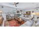 Bright and airy living room with a comfortable seating arrangement at 6216 Kevesta Ave, Palmetto, FL 34221