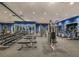 Modern fitness center with a variety of exercise equipment at 6217 Colmar Pl, Apollo Beach, FL 33572