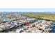 Aerial view of home and surrounding neighborhood at 6518 Senegal Palm Way, Apollo Beach, FL 33572