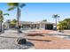 Attractive single-story home with a modern garage door and landscaped yard at 6518 Senegal Palm Way, Apollo Beach, FL 33572