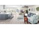 Open-concept living area featuring a spacious kitchen and Gathering room at 6518 Senegal Palm Way, Apollo Beach, FL 33572