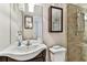 Updated bathroom with a shower and a vanity at 7701 Starkey Rd # 105, Seminole, FL 33777