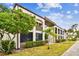 Building exterior showcasing landscaping and architecture at 7701 Starkey Rd # 105, Seminole, FL 33777