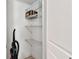 White storage closet with wire shelving at 7701 Starkey Rd # 105, Seminole, FL 33777