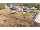 Aerial view of house, expansive backyard, and surrounding homes at 8131 Spring Forest Ln, Wesley Chapel, FL 33544