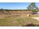 Spacious backyard with wood fired oven and open space at 8131 Spring Forest Ln, Wesley Chapel, FL 33544