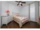 Charming bedroom with a floral bedspread at 8131 Spring Forest Ln, Wesley Chapel, FL 33544