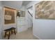 Bright entryway with built-in bench seating and shoe storage at 8131 Spring Forest Ln, Wesley Chapel, FL 33544