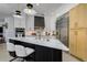 Modern kitchen with marble island and gold accents at 8131 Spring Forest Ln, Wesley Chapel, FL 33544