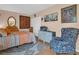 Bedroom with floral armchair and patterned rug at 90 S Highland Ave # 423, Tarpon Springs, FL 34689