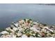 Aerial view showcasing waterfront home and neighborhood at 911 Boca Ciega Isle Dr, St Pete Beach, FL 33706