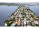 Wide aerial view showing the property's location on a peninsula with water access at 911 Boca Ciega Isle Dr, St Pete Beach, FL 33706