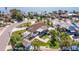 Aerial view of property, showcasing the home and pool at 911 Boca Ciega Isle Dr, St Pete Beach, FL 33706