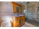 A well-maintained bathroom with a large shower and vanity at 911 Boca Ciega Isle Dr, St Pete Beach, FL 33706