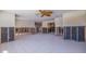Large living room undergoing renovation with tile floors at 911 Boca Ciega Isle Dr, St Pete Beach, FL 33706