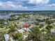 Aerial view of home and surrounding area, showcasing waterfront proximity at 1004 Peninsula Ave, Tarpon Springs, FL 34689