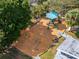 Aerial view of a playground with swings and play equipment at 1004 Peninsula Ave, Tarpon Springs, FL 34689