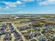 Aerial view of houses and landscape at 10515 Fenceline Rd, New Port Richey, FL 34655