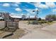 Farm with windmill and buildings at 10515 Fenceline Rd, New Port Richey, FL 34655