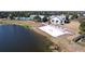 Private beach area with lake access and sandy shore at 11525 Lake Lucaya Dr, Riverview, FL 33579