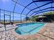 Screened pool and patio area with lake view at 11525 Lake Lucaya Dr, Riverview, FL 33579