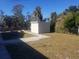 Large backyard with shed and grassy area at 1434 Cleveland St # 4, Clearwater, FL 33755