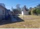 Large backyard with small shed and grassy area at 1434 Cleveland St # 4, Clearwater, FL 33755