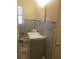 Bathroom with light blue tile and vanity at 1434 Cleveland St # 4, Clearwater, FL 33755