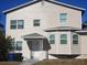 Two-story house with light beige vinyl siding at 1434 Cleveland St # 4, Clearwater, FL 33755