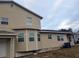 Rear view of tan two story house at 1434 Cleveland St # 4, Clearwater, FL 33755