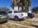 Exterior view of the property with cars parked in front at 1434 Cleveland St # 4, Clearwater, FL 33755