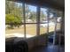 Cozy screened porch overlooking backyard and street view at 1434 Cleveland St # 4, Clearwater, FL 33755