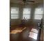 Bright spare bedroom with hardwood floors and multiple windows at 1434 Cleveland St # 4, Clearwater, FL 33755