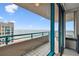 Balcony with glass doors and ocean view at 1540 Gulf Blvd # 2004, Clearwater, FL 33767