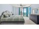 Spacious bedroom with ocean view and comfortable king-size bed at 1540 Gulf Blvd # 2004, Clearwater, FL 33767