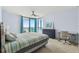 Main bedroom with ocean view and built-in workspace at 1540 Gulf Blvd # 2004, Clearwater, FL 33767