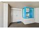 Condo entryway with white doors and blue window at 1540 Gulf Blvd # 2004, Clearwater, FL 33767