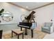 Grand piano in building lobby with seating area at 1540 Gulf Blvd # 2004, Clearwater, FL 33767