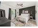 Main bedroom with king-size bed, and modern decor at 1584 S Washington Ave, Clearwater, FL 33756