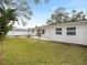 Spacious backyard with patio and fire pit at 1768 Algonquin Dr, Clearwater, FL 33755