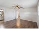 Spacious bedroom with ceiling fan and light wood flooring at 1768 Algonquin Dr, Clearwater, FL 33755