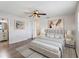 Main bedroom with ceiling fan, large closet, and ensuite bathroom at 1768 Algonquin Dr, Clearwater, FL 33755